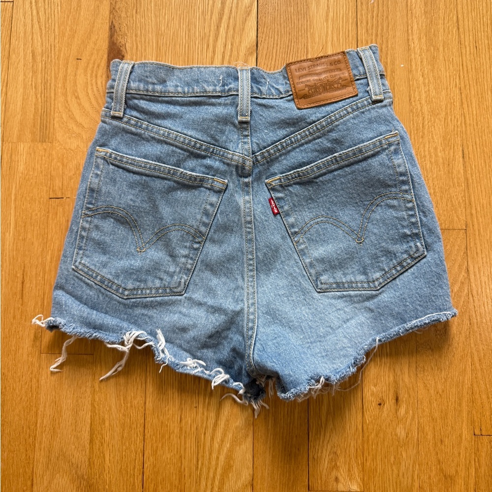 Levi's Ribcage Medium Blue Denim Cutoff Shorts with Frayed Hem